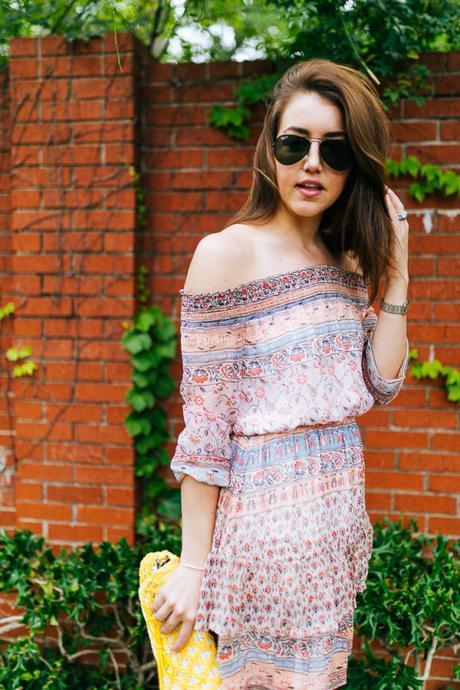 Dallas Blogger Amy Havins wears a printed off the shoulder shoshanna dress.