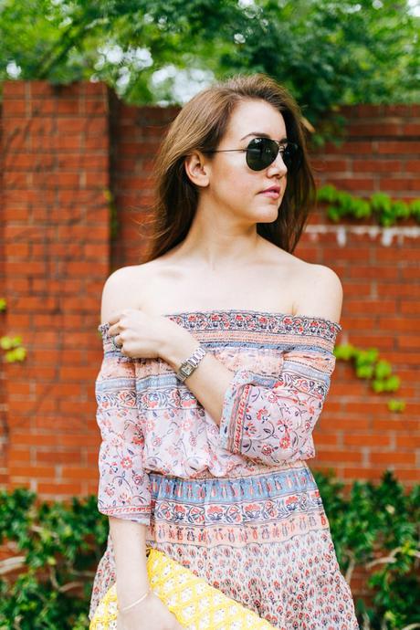 Dallas Blogger Amy Havins wears a printed off the shoulder shoshanna dress.