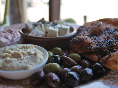 Mezze - Hummus, raita, olives, feta, taramasalata, harissa flatbread, rice & lentil salad