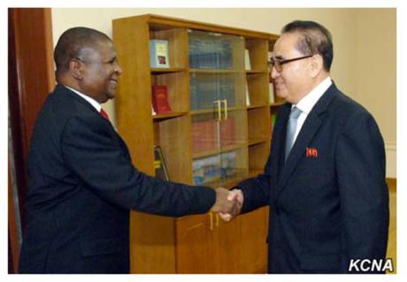 WPK Vice Chairman Ri Su Yong shakes hands with Mozambican