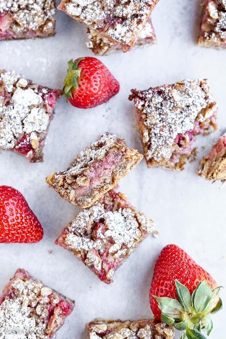 These Strawberry Oatmeal Crumble Bars feature fresh strawberries and an oatmeal crumb crust that doubles as the crumble topping! This quick and easy recipe is gluten-free and vegan.