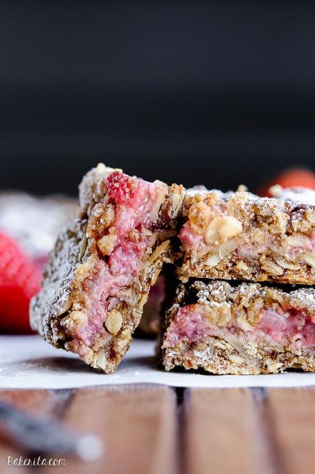 These Strawberry Oatmeal Crumble Bars feature fresh strawberries and an oatmeal crumb crust that doubles as the crumble topping! This quick and easy recipe is gluten-free and vegan.