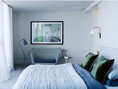 Blue And White Bedroom With Art Photo