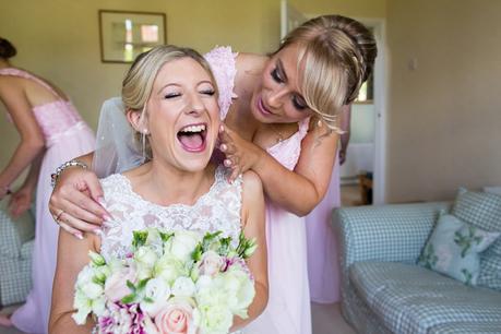 Planning yoru Wedding bride prep laughing hug