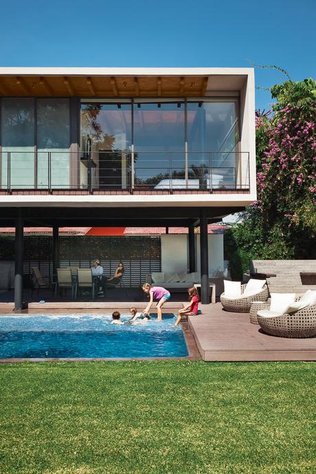 Modern backyard pool with Trex decking
