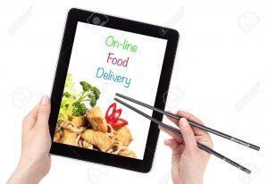 Online-Food-Delivery-concept-with-computer-isolated-Stock-Photo