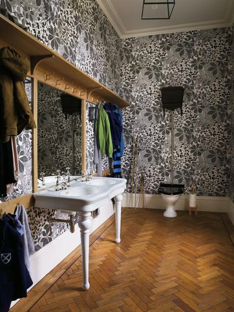 Herringbone Floor In Bathroom WIth Black & White Wallpaper 