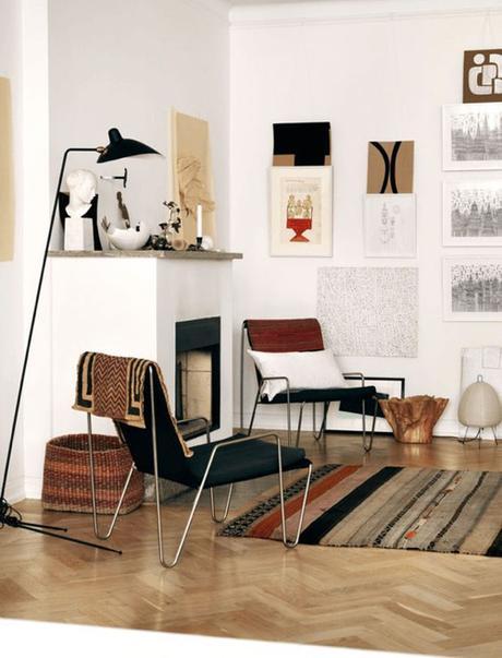 Earthy Artsy Living Room With Herringbone Floors And Modern Furnishings