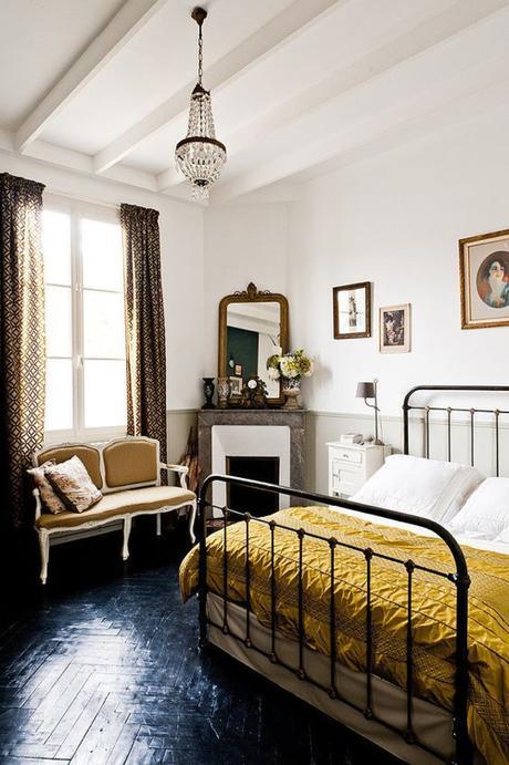 Cozy Bedroom With Traditional Styling And Painted Black Flooring