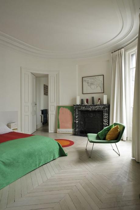 Bedroom With Pale Wood Floor & Green Accents