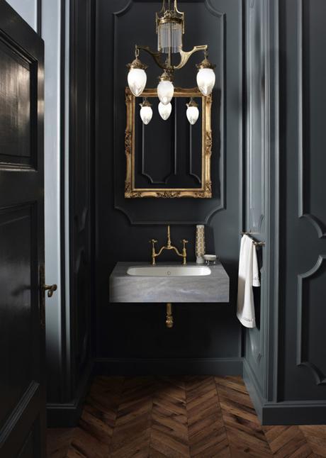 Black Powder Room With Gold Accents