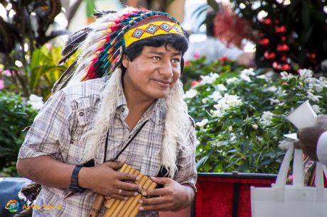 Embera indian offering a windpipe musical for all to enjoy