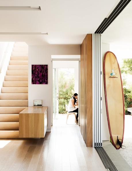 The indoor-outdoor staircase room of a venice bungalow. 