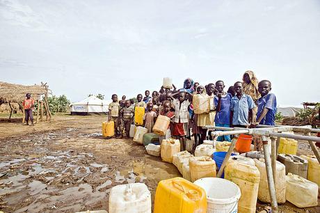 Water Shortage: Causes, Effects and Solutions children-and-women-in-line-for-water-crisis-shortage