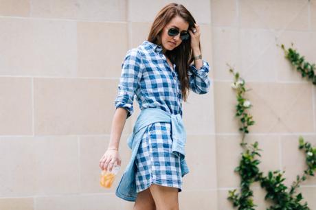 Amy Havins wears a buffalo print shirtdress.