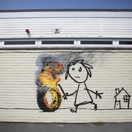 Banksy leaves mural on side of classroom