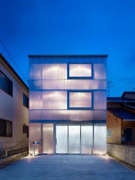 Plastic and steel house in Hiroshima Japan with luminescent facade by Suppose
