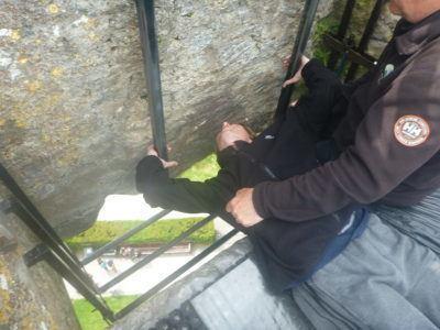 Kissing the Blarney Stone in County Cork, Republic of Ireland Me lower my head before kissing the Blarney Stone