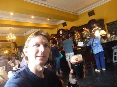 Kissing the Blarney Stone in County Cork, Republic of Ireland A pint at Christie's Pub at Blarney Castle and Gardens