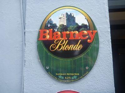 Kissing the Blarney Stone in County Cork, Republic of Ireland Local Beer at Blarney Castle and Gardens