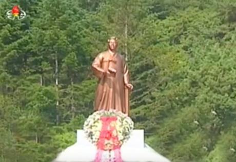 Kim Jong Un floral wreath in front of the Kim Hyong Jik statue in Chunggang County, Chagang Province. (Photo: Korean Central TV).