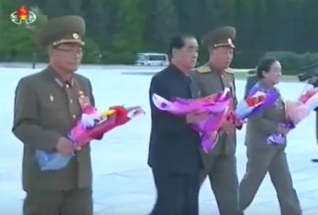 Minister of the People's Armed Forces and WPK Political Bureau Member General Pak Yong Sik, DPRK Prime Minister and WPK Political Bureau Presidium Member Pak Pong Ju, Minister of the People's Security and WPK Political Bureau Member General Choe Pu Il and WPK Party History Institute Director Kim Jong Im delivers floral bouquets to the Kim Il Sung statue at the Samjiyo'n Grand Monument on June 4, 2016 (Photo: Korean Central TV).