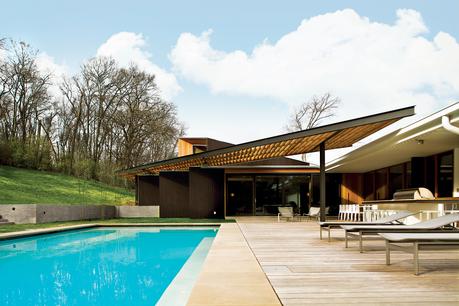 Modern house with ipe pool terrace and Douglas fir trellis 