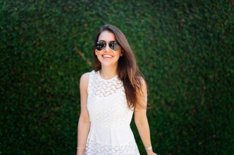 Dallas blogger, Amy Havins, wears a white shoshanna midi dress.