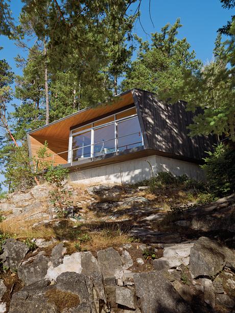 Sustainable cabin with hooded deck exterior near Vancouver