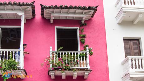 Enjoying the perfect Cartagena weather, this man is watching the locals while texting for a later dinner meeting.