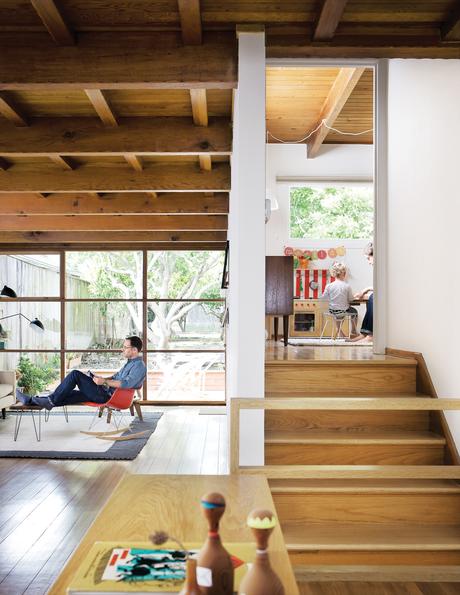 Modern living room with exposed wooden rafters