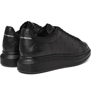 Bevelled Black:  Alexander McQueen Exaggerated-Sole Embossed Leather Sneakers