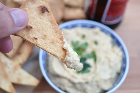 houmous or hummus made with toasted sesame oil and served with homemade corn tortilla chips