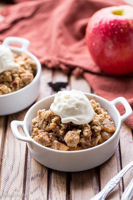 This Oatmeal Cookie Apple Crisp has a simple spiced apple filling, topped with a super easy oatmeal cookie crumble topping! Serve it warm with vanilla ice cream for an outstanding quick dessert.