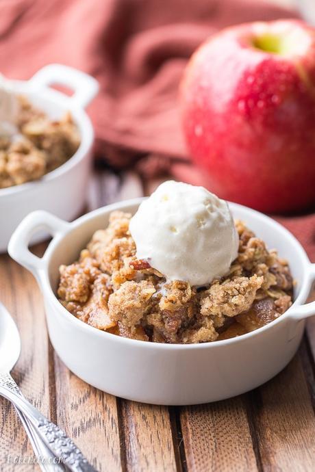 This Oatmeal Cookie Apple Crisp has a simple spiced apple filling, topped with a super easy oatmeal cookie crumble topping! Serve it warm with vanilla ice cream for an outstanding quick dessert.