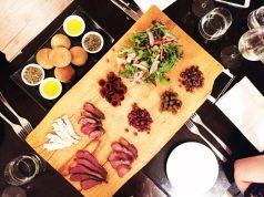 Native Plate made with crocodile, emu, kanagaroo, quandongs, Lilly Pillys, desert limes and muntries and damper with lemon myrtle dukkah and olive oil.