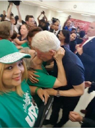 Bill Clinton kisses woman at campaign rally 5-27-2016