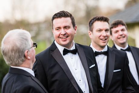 groom outside with his ushers