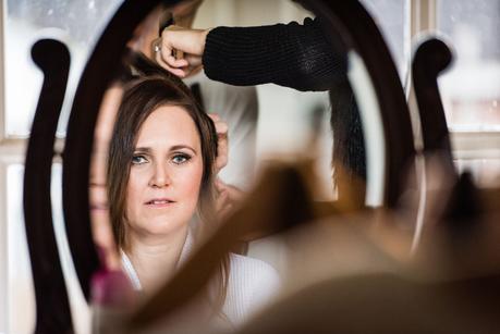 bride having her hair done