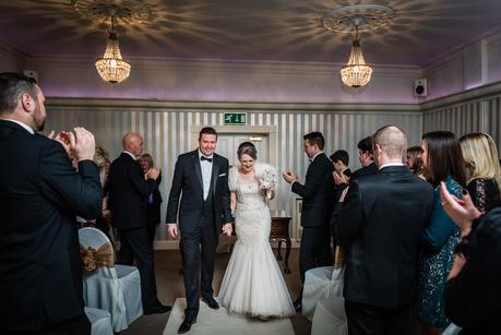 couple walking away after being married