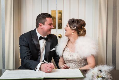 couple signing the register