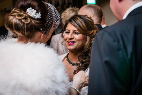 bride talking to guest