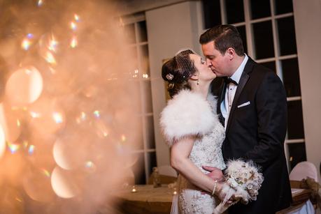 bride and groom kissing - Warwick House Weddings