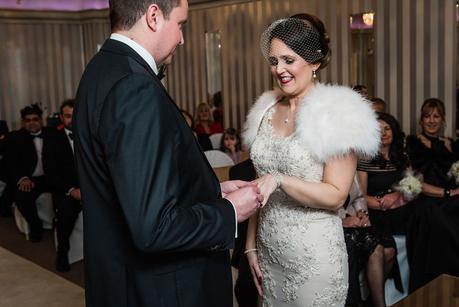 groom exchanging rings