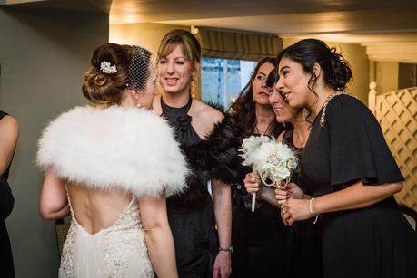 bride talking to bridesmaids
