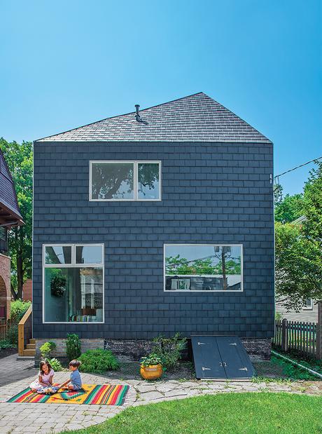 Modern Illinois farmhouse addition exterior facade with composite slate siding by Inspire Roofing Products