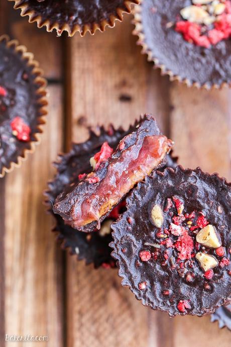 These Chocolate Peanut Butter & Jelly Cups are homemade peanut butter cups with an added layer of jam or jelly! This healthier candy recipe is only 5 ingredients, and uses an easy refined sugar free chocolate recipe.