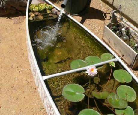 Rowing Boat Transformed Into a Garden Pond