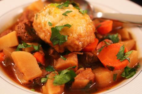 Guinness Beef Stew with Turnips and Parnsips cheddar herb dumplings plated