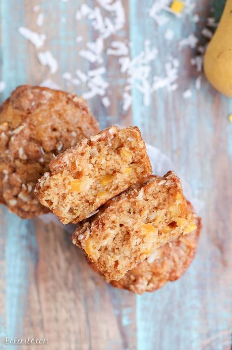 These Mango Coconut Crumble Muffins are tender and full of tropical flavor! These vegan muffins use coconut oil, coconut flakes, and fresh diced mango for a treat that will make you feel like you're on vacation.